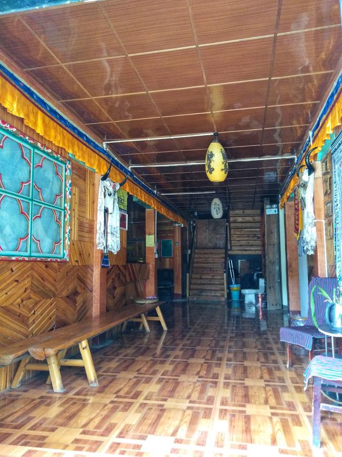 Zishuo Zihua Guest House Daocheng Exterior photo